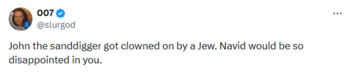 Screenshot of a public post containing racial and antisemitic slurs