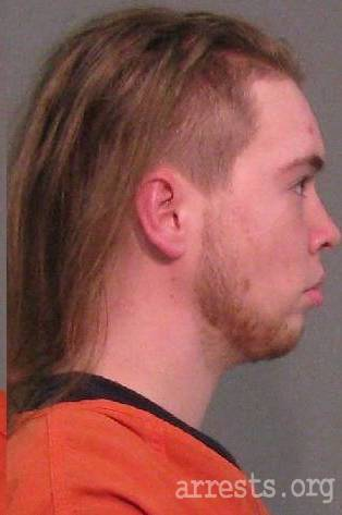 Profile booking photograph, first set