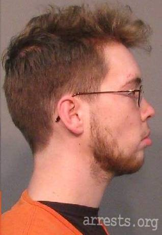 Profile booking photograph, second set